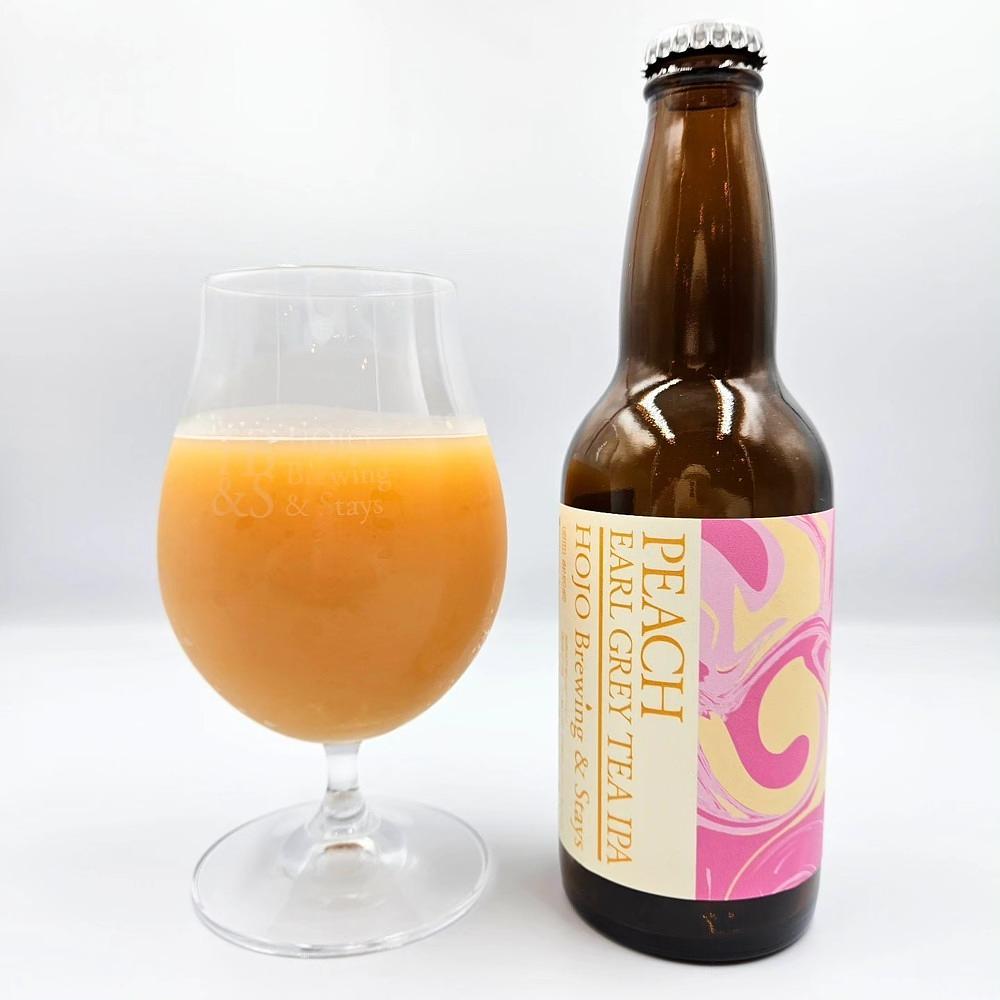 Peach Tea IPA by Storytellers Brewery and Meet House, LLC